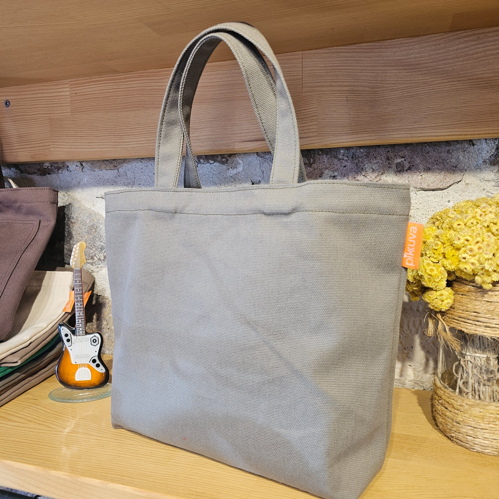 Light Khaki Canvas Bag with External Pocket and Handles